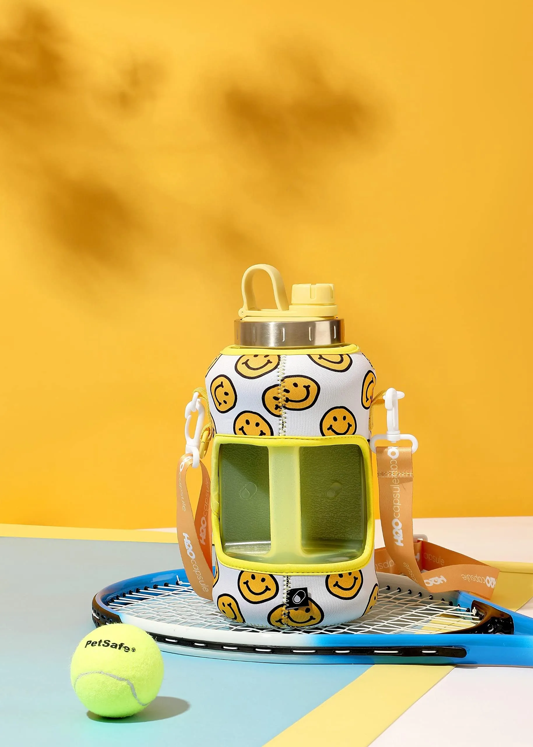 H2O Capsule 2.2L Half Gallon Wide Mouth Water Bottle with Storage Sleeve and Removable Straw - Hydration Tracker Jug with Measurements Marked – Shatterproof BPA-Free, (Happy Day)